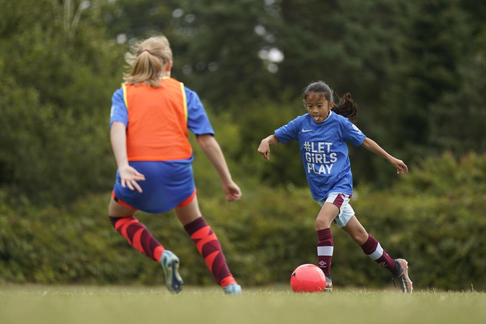 Young girls take part during the FA's Let Girls Play Big Football Day event at the Kings College Fields, Ruislip. Let Girls Play Big Football Day is calling on grassroots clubs from across the country to get involved and celebrate the start of the England Women's World Cup campaign and the growth of women's and girl's football. Picture date: Saturday July 22, 2023. (Photo by Aaron Chown/PA Images via Getty Images)