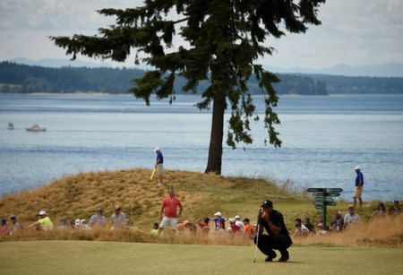 Tiger Woods lines up a putt on the 3rd green in the first round of the 2015 U.S. Open golf tournament at Chambers Bay. Mandatory Credit: Kyle Terada-USA TODAY Sports