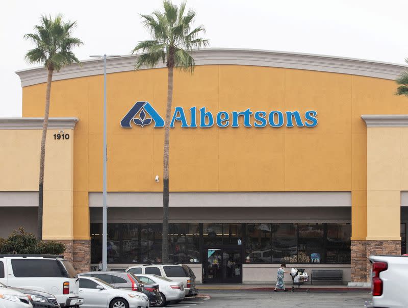 FILE PHOTO: A customer leaves an Albertsons grocery store in Riverside