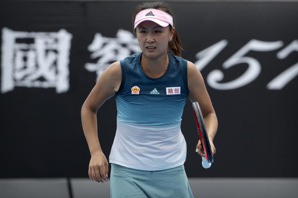 China's Peng Shuai reacts while competing against Canada's Eugenie Bouchard in their first round match at the Australian Open tennis championships in Melbourne, Australia, Tuesday, Jan. 15, 2019. The disappearance of tennis star Peng Shuai in China following her accusations of sexual assault against a former top Communist Party official has shined a spotlight on similar cases involving political dissidents, entertainment figures, business leaders and others who have run afoul of the authorities. (AP Photo/Mark Schiefelbein)