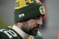 Green Bay Packers quarterback Aaron Rodgers (12) walks off the field after the NFC championship NFL football game against the Tampa Bay Buccaneers in Green Bay, Wis., Sunday, Jan. 24, 2021. The Buccaneers defeated the Packers 31-26 to advance to the Super Bowl. (AP Photo/Morry Gash)