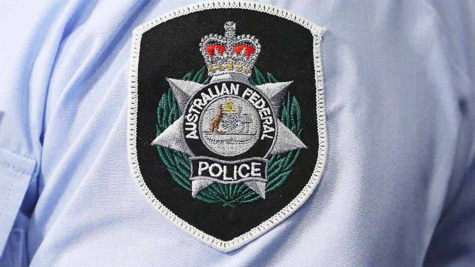 The Australian Federal Police badge, pictured here at a press conference.