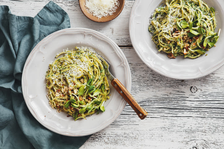 Plates of pesto pasta