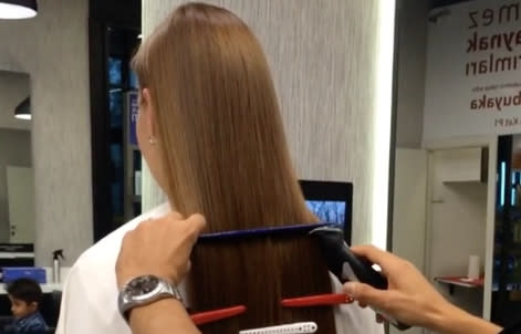 This hair cutting technique has us TOTALLY baffled, and we can’t look away