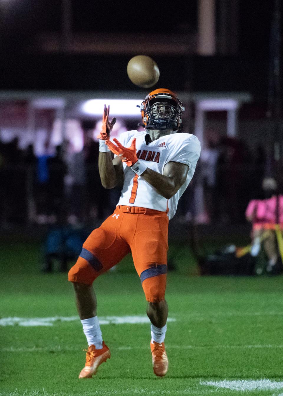 Akeem Stokes (1) receives the kickoff after the Jaguars took a 14-0 lead during the Escambia vs West Florida football game at West Florida High School in Pensacola on Friday, Aug. 26, 2022.