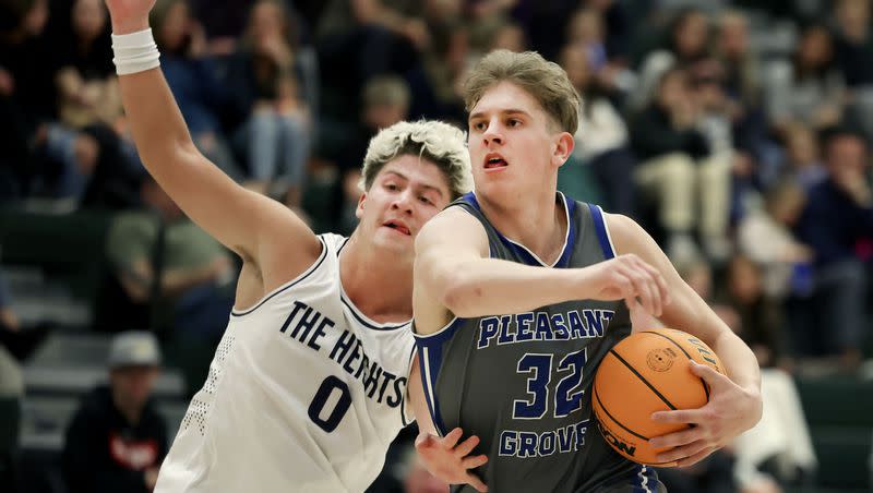 Pleasant Grove’s Clay Hansen drives past Brighton’s Nash Matheson in a neutral tournament game at Olympus High School in Holladay on Thursday, Dec. 28, 2023.