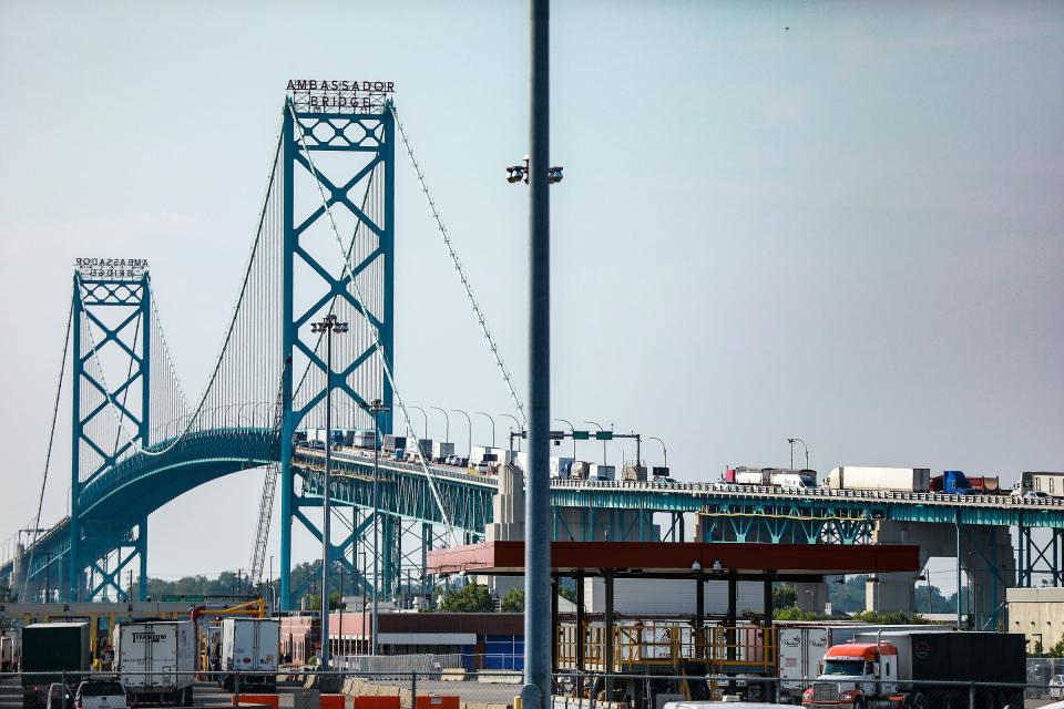 Traffic is backed up on Interstate 75 leading to the Ambassador Bridge headed into Canada due to a Canadian Border Patrol strike, in Detroit on Friday, Aug. 6, 2021. 