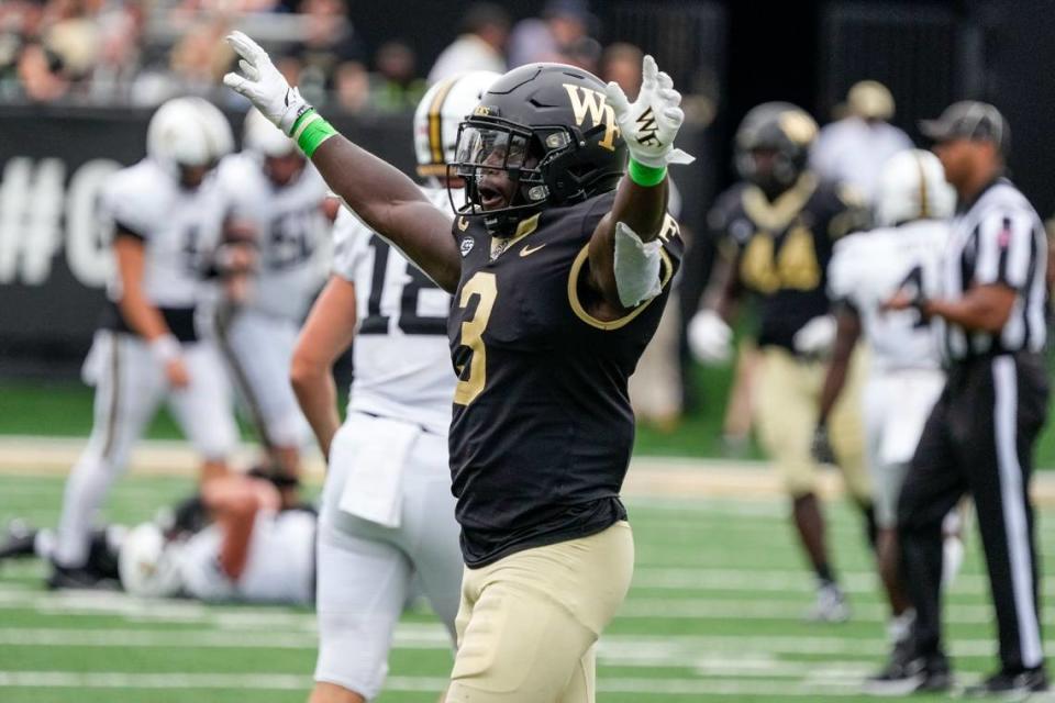 Wake Forest Demon Deacons defensive back Malik Mustapha (3) celebrates a 2023 win against Vanderbilt. Jim Dedmon-USA TODAY Sports