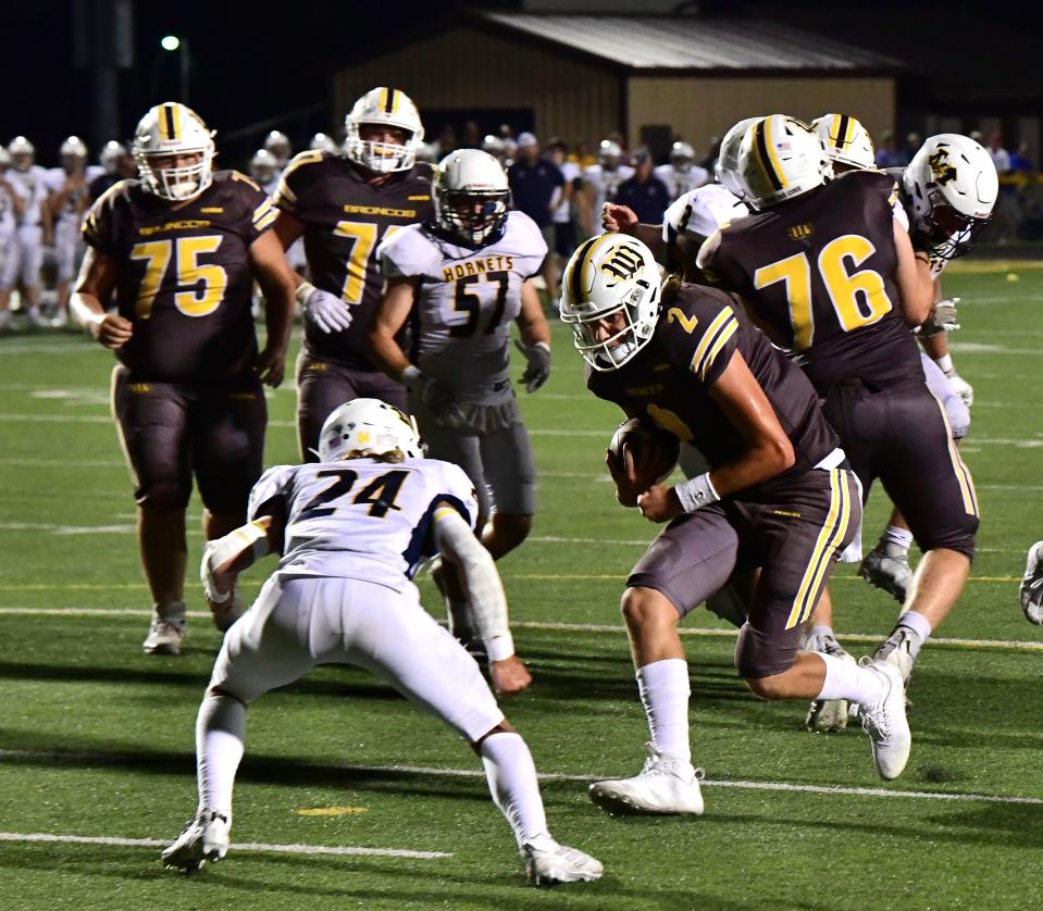 Drew Novak (2) lowers his head and finds the endzone for a Western Brown touchdown at the Monroe vs. Western Brown football game Friday, Sept. 2, 2022.