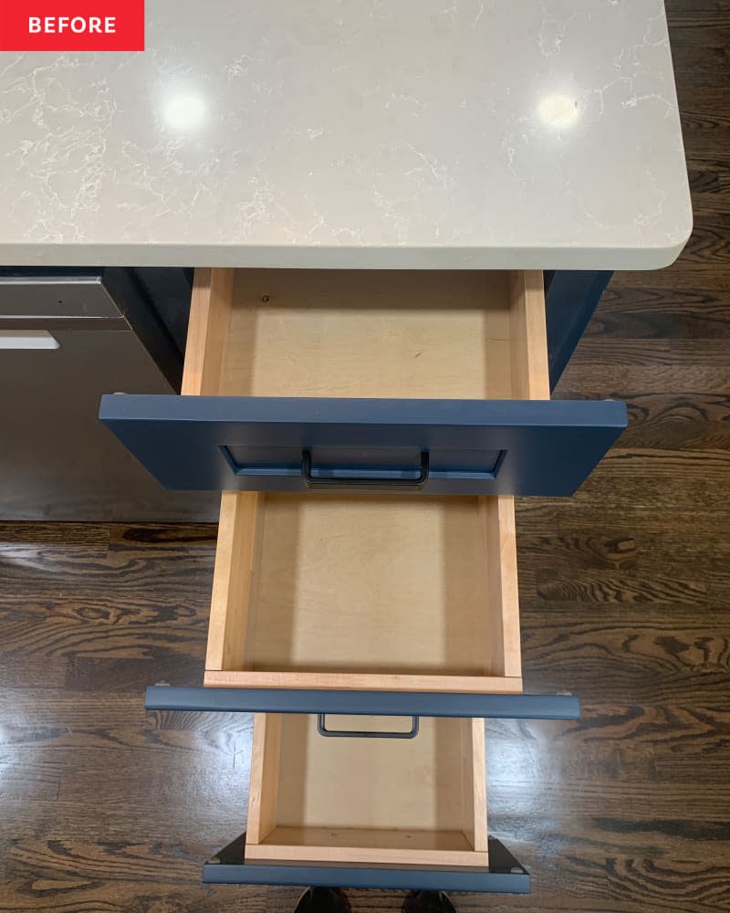 Open drawers in newly remodeled kitchen.