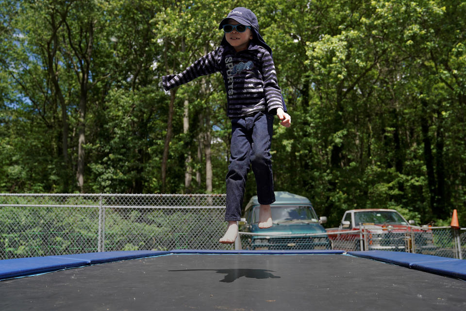 Baraka Lusambo jumps on a trampoline