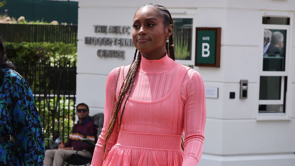 Actor Issa Rae attends the Wimbledon Tennis Championships in London wearing Barbie pink on July 15, 2023. While strike guidelines don’t allow for commercial promotional work for film or TV projects, they do not prohibit other opportunities such as fashion week appearances and sporting events. - Neil Mockford/GC Images/Getty Images