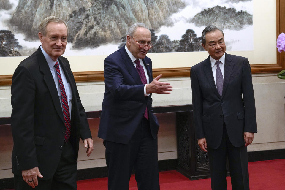 U.S. Senate Majority Leader Chuck Schumer, D-N.Y., center, and U.S. Sen. Mike Crapo, R-Idaho, left, meet with Chinese Foreign Minister Wang Yi, right, at the Diaoyutai Guest House in Beijing, Monday, Oct. 9, 2023. (AP Photo/Andy Wong, Pool)