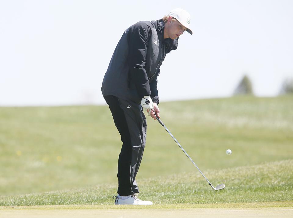Roland-Story's Ben Greenfield chips the ball into the 8th hole during the Heart of Iowa boys golf meet at the Lincoln Valley Golf Course Tuesday, May 2, 2023, in State Center, Iowa.