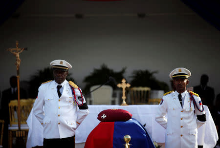 Members of the National Palace General Security Unit (USGPN) stand beside the coffin of Haiti's former President Rene Preval during his funeral in Port-au-Prince, Haiti, March 11, 2017. REUTERS/Andres Martinez Casares