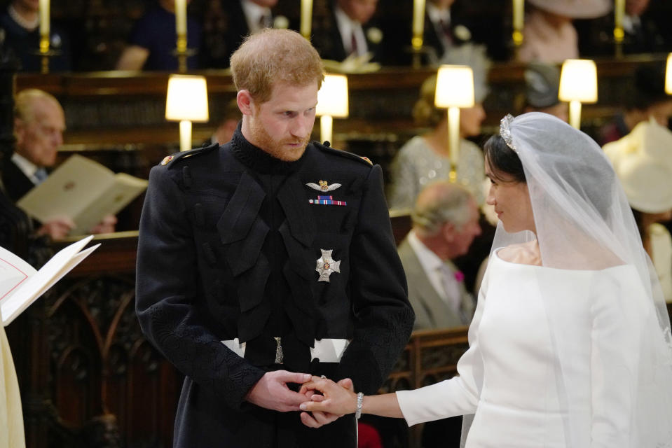 4 in series of 10. File photo dated 19/5/2018 of Prince Harry and Meghan Markle during their wedding service at St George's Chapel in Windsor Castle.