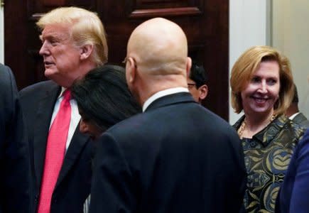 FILE PHOTO: White House Deputy National Security Advisor Mira Ricardel (R) appears with U.S. President Donald Trump at a Diwali ceremony as the office of first lady Melania Trump announced a request from the first lady that Ricardel be fired at the White House in Washington, U.S. November 13, 2018. REUTERS/Jonathan Ernst/File Photo