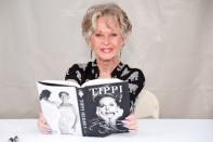 <p>The screen siren published an eponymous memoir, <em>Tippi</em>, in 2016, which recounts her rise to stardom and animal activism as well as some of the darker truths about director Alfred Hitchcock, <a href="https://people.com/movies/tippi-hedren-alfred-hitchcock-abuse-allegations-after-granddaughter-dakota-johnson-resurfaces-claims/" rel="nofollow noopener" target="_blank" data-ylk="slk:whom she claims sexually assaulted her.;elm:context_link;itc:0;sec:content-canvas" class="link ">whom she claims sexually assaulted her.</a></p>