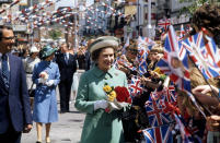 <p>The Queen on a walkabout in Portsmouth during her Silver Jubilee tour of Great Britain in 1977. (Getty Images)</p> 