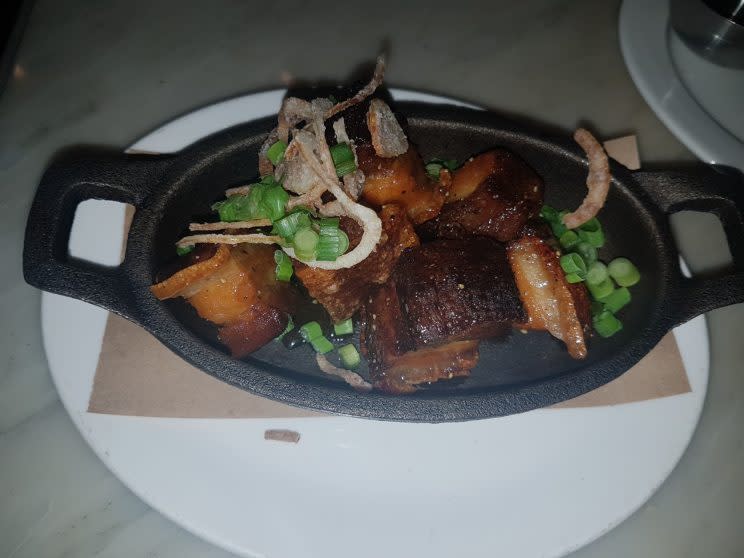 The yummy maple butter pork belly is a must-try dish at Homer Street café