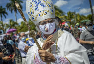 Cardinal Leopoldo Brenes blesses faithful at the end of procession to the Cathedral, in Managua, Nicaragua, Saturday, Aug. 13, 2022. The Catholic Church called on faithful to peacefully arrive at the Cathedral in Managua Saturday after National Police denied permission for a planned religious procession on “internal security” grounds. (AP Photo)