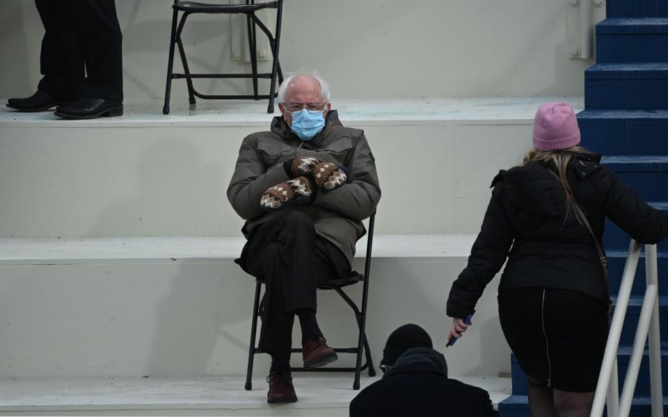 Former presidential candidate, Senator Bernie Sanders (D-Vermont) sits in the bleachers on Capitol Hill before Joe Biden is sworn in as the 46th US President on January 20, 2021, at the US Capitol in Washington, DC - GETTY IMAGES