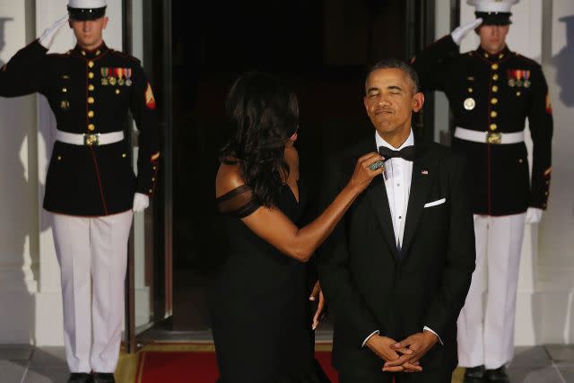 All eyes were on Michelle Obama when she arrived at the China State Dinner held Friday at the White House in Washington, D.C. The First Lady looked effortlessly posh, donning an off-the-shoulder black silk crepe mermaid gown by designer Vera Wang, as she welcomed China's president, Xi Jinping, as the evening's guest of honor. <strong> WATCH: Pope Francis' First Visit to U.S. Has Celebrities Freaking Out</strong> The beautiful custom gown features an architectural V-neckline and tulle sleeves, accented by a hand-draped silk textural organza pleated skirt. Getty Images Obama took to social media to share a photo from inside the dinner party, and, of course, that dress. "First glance at tonight's China State Dinner," the 51-year-old tweeted. First glance at tonight's China State Dinner. pic.twitter.com/8JSkABvvdX— The First Lady (@FLOTUS) September 25, 2015 There were over 200 guests in attendance, including <em>Empire</em> co-creator Lee Daniels, political scientist Henry Kissinger, ballet dancer Misty Copeland, Apple CEO Tim Cook, Facebook creator Mark Zuckerberg and entertainment industry executives, including Disney CEO Bob Iger and DreamWorks Animation CEO Jeffrey Katzenberg. Before guests arrived, Obama teased a few other sneak peeks of the event. "Crossing the t's and dotting the i's for tonight's China State Dinner," she shared on Twitter. Crossing the t's and dotting the i's for tonight's China State Dinner. http://t.co/CZDygYZzdq pic.twitter.com/zdQG1pi8m0— The First Lady (@FLOTUS) September 25, 2015 <strong> PHOTOS: Michelle Obama: First Lady of Fashion</strong> "Farm to table happens right here at the @WhiteHouse! Tonight's State Dinner includes peppers from the Kitchen Garden," another tweet read. Farm to table happens right here at the @WhiteHouse! Tonight’s State Dinner includes peppers from the Kitchen Garden. pic.twitter.com/lV2sGWU8Q9— The First Lady (@FLOTUS) September 25, 2015 Ahead of the dinner, President Barack Obama and the first lady greeted Xi and his wife with a 21-gun salute on the South Lawn and a red carpet ceremony. Following photos, Barack and Michelle shared a sweet moment, which was captured on video. "May I just say, you look stunning," POTUS says to his wife. President Obama to @flotus: "May I just say, you look stunning." ������ #ChinaStateDinner pic.twitter.com/L90WZiY1rE— Kate Bennett (@KateBennett_DC) September 25, 2015 As if that weren't adorable enough, another cute moment between the two was captured as Michelle fixed the President's bow tie. Getty Images <strong> NEWS: Prince Harry Meets Michelle Obama For Tea</strong> The first lady's 54-year-old husband wasn't the only one stunned by his wife's flawless look. The Internet went crazy, gushing over her stylish getup over social media. "Michelle Obama is the best argument against term limits," director Ava DuVernay tweeted along with four pics of Obama from the event. Michelle Obama is the best argument against term limits. - @KaraRBrown pic.twitter.com/gcky3S0Zf5— Ava DuVernay (@AVAETC) September 26, 2015 "Michelle Obama in Vera Wang got Barack lookin like he just realized his date to prom is by far the hottest," comedian Lisa Vikingstad tweeted. Michelle Obama in Vera Wang got Barack lookin like he just realized his date to prom is by far the hottest. pic.twitter.com/Me8kLYthCb— Lisa Vikingstad (@LisaVikingstad) September 26, 2015 The dress' designer, Vera Wang, felt honored by the accolades. "It is such a privilege, as an American of Chinese heritage, to have dressed First Lady @MichelleObama for this state dinner honoring President Xi Jinping and First Lady Peng Liyuan, of the People's Rebublic of China," she tweeted. It is such a privilege, as an American of Chinese heritage, to have dressed First Lady @MichelleObama for this st… http://t.co/PwJiX3d17s— Vera Wang (@VeraWangGang) September 25, 2015 Watch the video below to hear the first lady discuss what she's going to miss about living the White House.