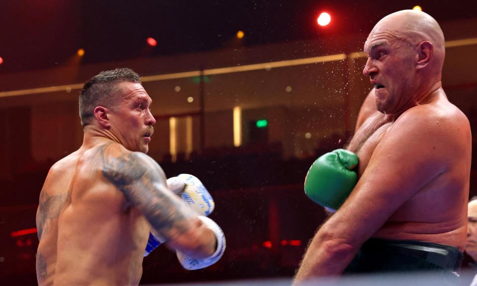 <span>Ukraine's Oleksandr Usyk and Britain's Tyson Fury fight for the heavyweight boxing world championship in Riyadh, Saudi Arabia.</span><span>Photograph: Fayez Nureldine/AFP/Getty Images</span>