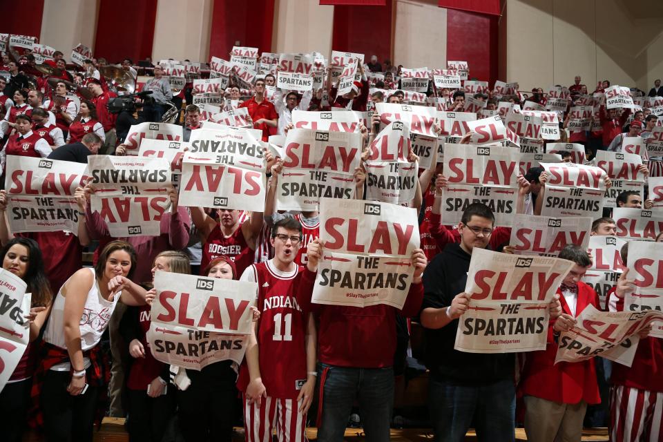 Mar 7, 2015; Bloomington, IN, USA; Indiana Hoosier fans hold up newspapers before the game as Michigan State Spartans players are introduced at Assembly Hall.