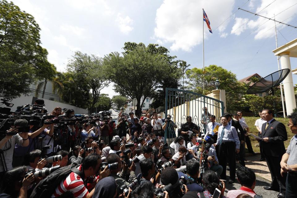 North Korea's Ambassador to Malaysia Kang Chol, right, speaks to the media outside the North Korean Embassy in Kuala Lumpur, Malaysia, Monday, Feb. 20, 2017. Security camera footage obtained by Japanese television appears to show a careful and deliberate attack last week on the exiled half brother of North Korea's ruler, while Malaysia said Monday it had recalled its ambassador to North Korea amid rising tensions between the nations. (AP Photo/Vincent Thian)