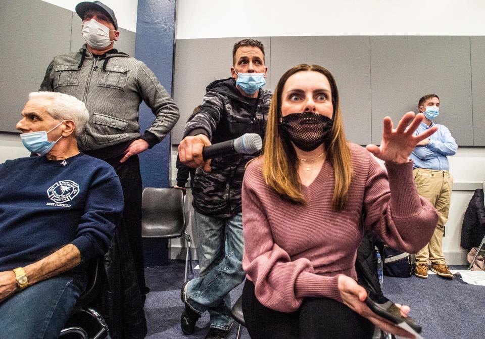 Parents speak out against their children using masks during the public study session of the Millcreek Township School Board, Feb. 22, 2022, at the Millcreek Education Center. The board was considering making recommendations that masks be optional in the Millcreek Township School District beginning March 1. The board voted on Feb. 28 to make masks optional.  