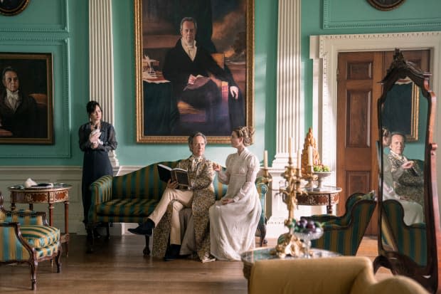 Anne Elliot (Dakota Johnson), Sir Walter Elliot (Richard E. Grant) and Elizabeth (Yolanda Kettle) in their grand home, Kellynch.<p>Photo: Nick Wall/Courtesy of Netflix</p>