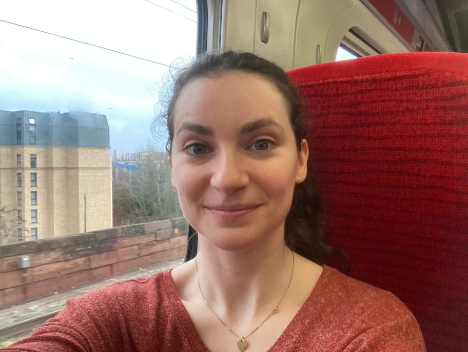 Insider reporter Talia Lakritz takes a selfie on a train.