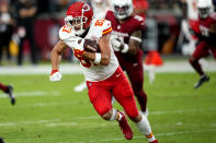 Kansas City Chiefs tight end Travis Kelce (87) runs the ball after a catch against the Arizona Cardinals during the first half of an NFL preseason football game, Saturday, Aug. 19, 2023, in Glendale, Ariz. (AP Photo/Ross D. Franklin)