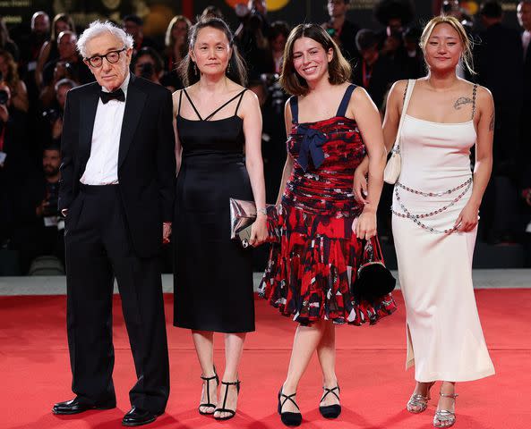 <p>Andreas Rentz/Getty </p> Woody Allen, Soon-Yi Previn, Manzie Tio Allen and Bechet Allen attend a red carpet for the movie "Coup De Chance" at the 80th Venice International Film Festival on September 04, 2023.