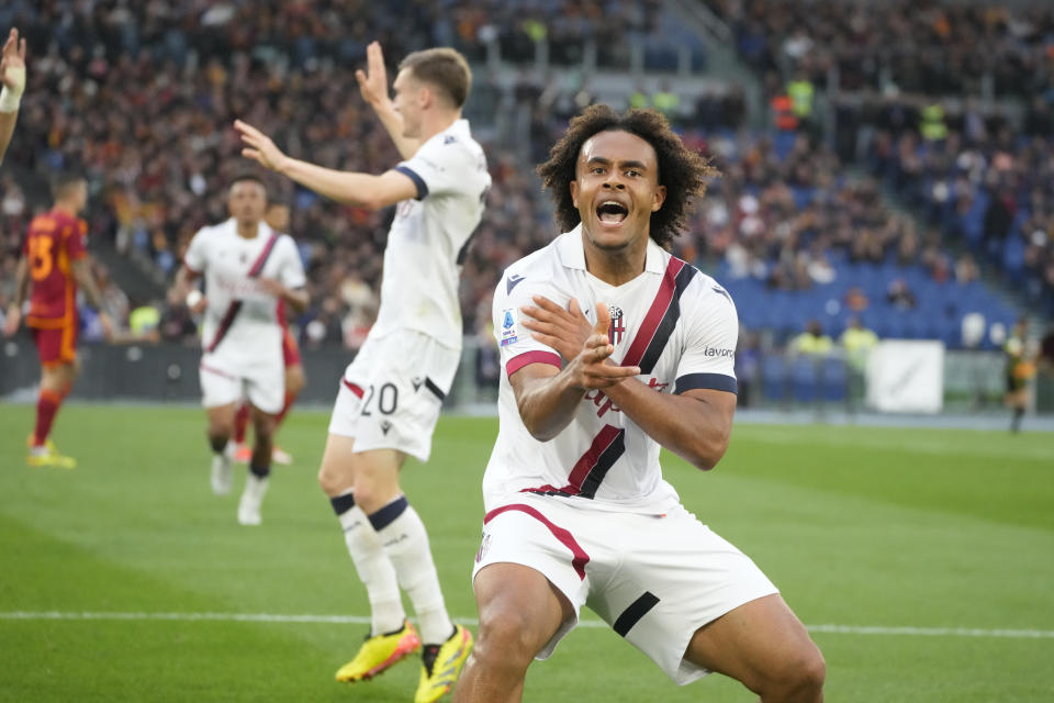 Bologna's Joshua Zirkzee celebrates after scoring the second goal against Roma during the Italian Serie A soccer match between Roma and Bologna at Rome's Olympic Stadium, Monday, April 22, 2024. (AP Photo/Gregorio Borgia)