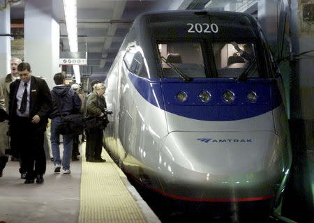 The Amtrak Acela Express, North America's first high-speed passenger train, sits at Penn Station in New York in this November 16, 2000 file photo. REUTERS/Staff/Files