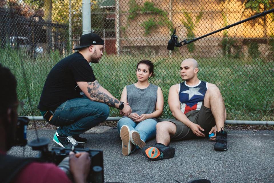 Ramon Pesante (left) directs “Playing Sam” stars Jenni Ruiza (middle) and Marc Reign (right) during a break in the filming.