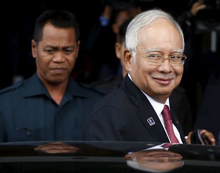 Malaysia's Prime Minister Najib Razak leaves parliament in Kuala Lumpur, Malaysia, January 26, 2016. REUTERS/Olivia Harris