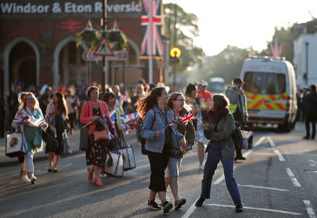 People arrive at the train station ahead of the wedding of Britain’s Prince Harry to Meghan Markle, in Windsor, Britain May 19, 2018. REUTERS/Benoit Tessier