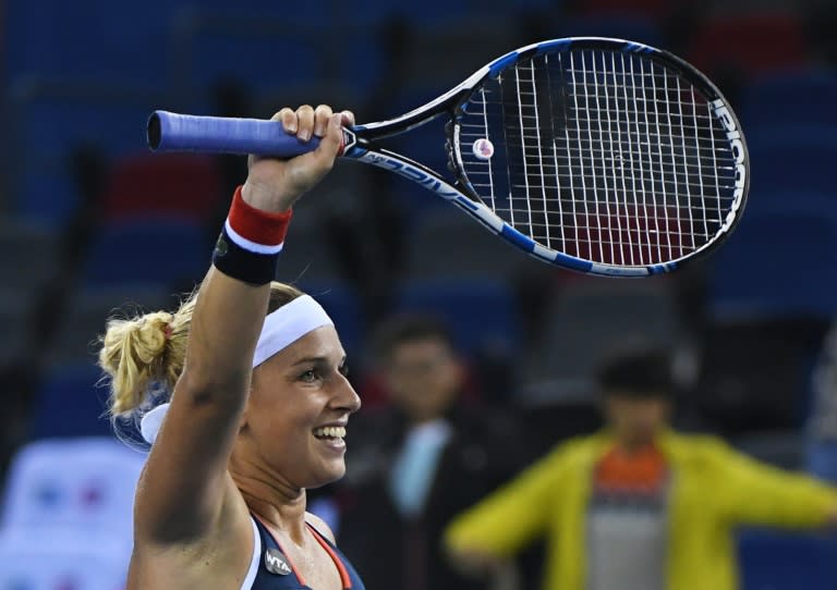 Dominika Cibulkova celebrates winning her semi-final against Svetlana Kuznetsova at the WTA Wuhan Open in China on September 30, 2016