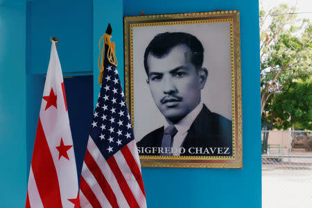 A portrait of Sigfredo Chavez is seen at the Immigrants Park prior to a ceremony to welcome Washington D.C. mayor Muriel Bowser in Intipuca, El Salvador August 14, 2018. Sigfredo Chavez was the first migrant from Intipuca to travel to the U.S. in 1967. REUTERS/Jose Cabezas