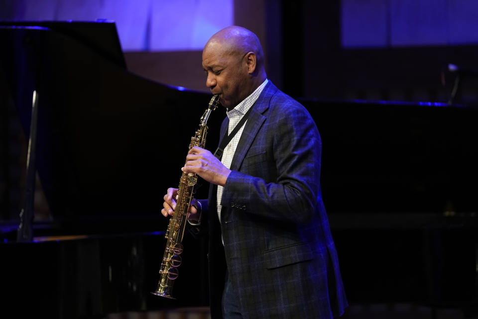 Branford Marsalis performs as he is introduced as the new artistic director for the Ellis Marsalis Center at The Musician's Village in New Orleans, Tuesday, Jan. 30, 2024. (AP Photo/Gerald Herbert)