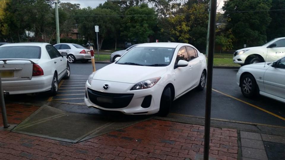 Pictured is a Mazda parked on an angle outside shops in the Sydney suburb of Telopea. 