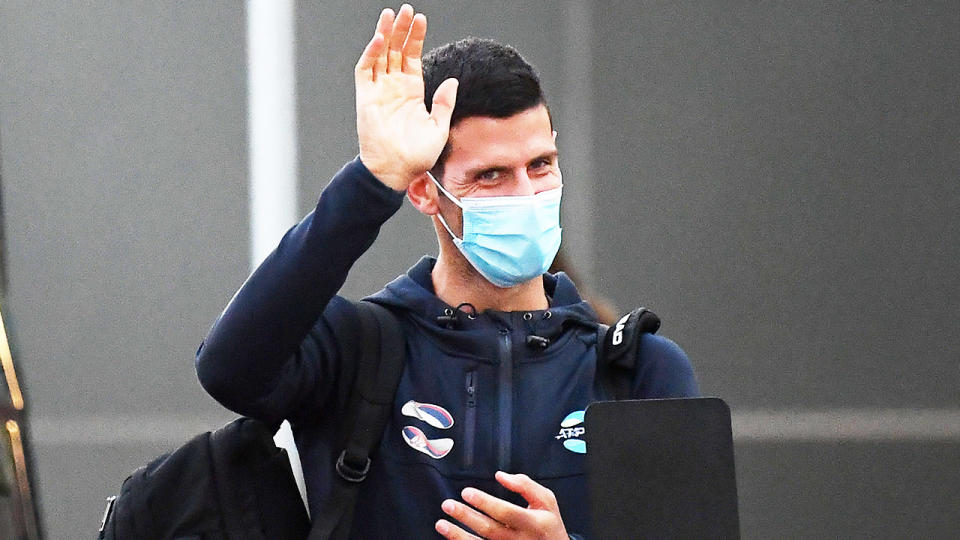 Novak Djokovic (pictured) arriving in Australia wearing a mask.