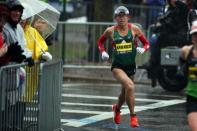 Apr 16, 2018; Boston, MA, USA; Yuki Kawauchi turns onto Hereford street on the 2018 Boston Marathon course. Mandatory Credit: Paul Rutherford-USA TODAY Sports