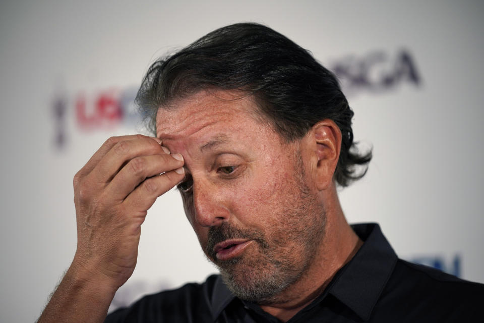 Phil Mickelson ponders a question at a press conference, Monday, June 13, 2022, at The Country Club in Brookline, Mass., ahead of the U.S. Open golf tournament. (AP Photo/Robert F. Bukaty)