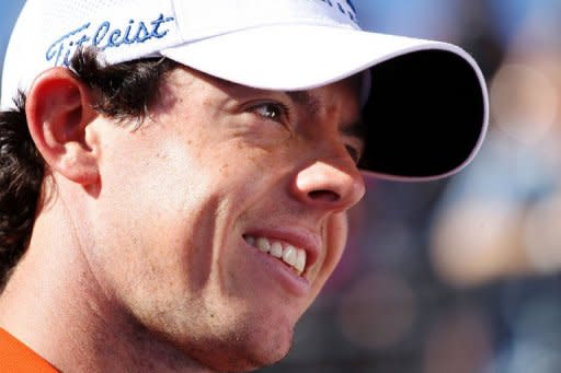 Rory McIlroy of Northern Ireland smiles after winning his match against Sang-moon Bae of South Korea during the quarterfinal round of the World Golf Championships-Accenture Match Play Championship at the Ritz-Carlton Golf Club in Marana, Arizona