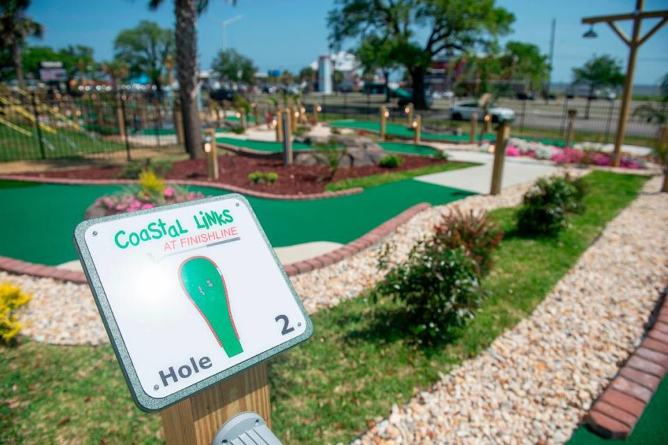 The new Coastal Links mini golf course at Finishline Performance Karting in Biloxi is tucked between one of the kart tracks and Beach Boulevard and beneath the zipline tower.