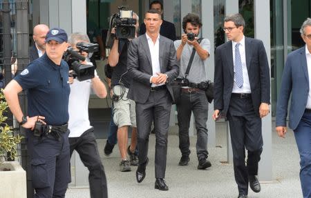 FILE PHOTO: Cristiano Ronaldo arrives at the Juventus' medical center in Turin, Italy July 16, 2018. REUTERS/Massimo Pinca